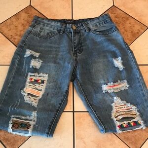 Fashion nova denim distressed jeans with patchwork